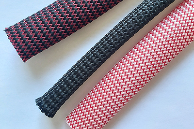 Geräuschdämpfende Schutzummantellung/ Geflechtschlauch mit Geräuschdämmung